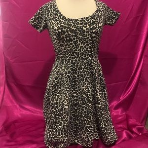 Leopard print dress by Jenifer size S, cris cross back, form fitting